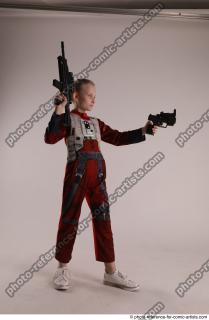 DENISA WITH TWO GUNS